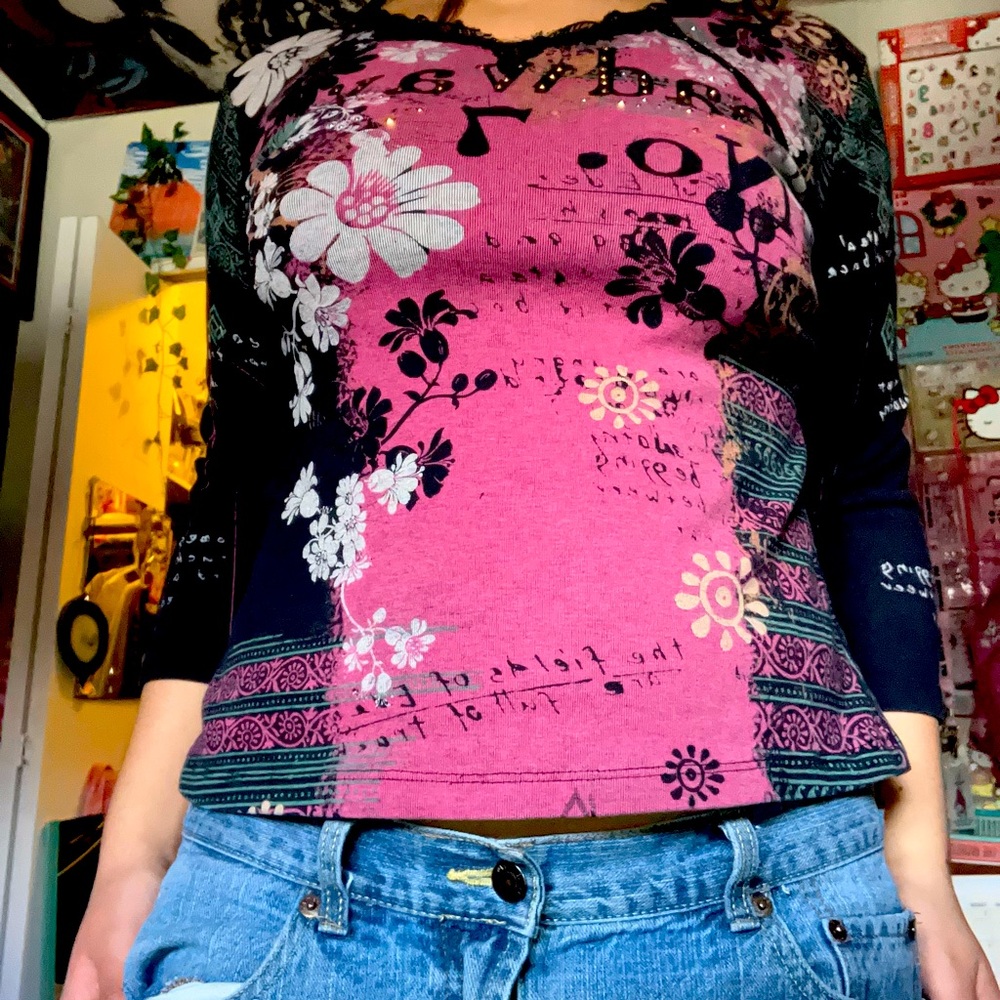 Pink/black long sleeve shirt/ white flowers/ green designs/ jewels